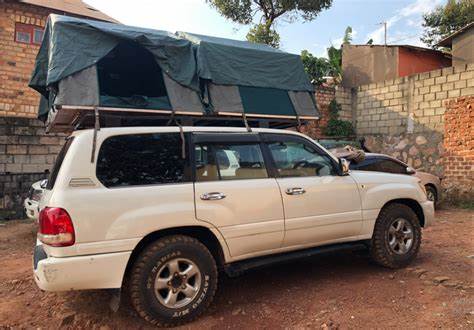 Land cruiser car rental with double roof top tents