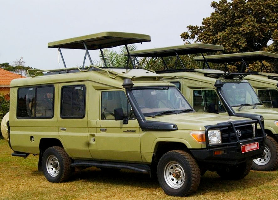 Land cruiser Extended with a pop up roof plus driver- Uganda